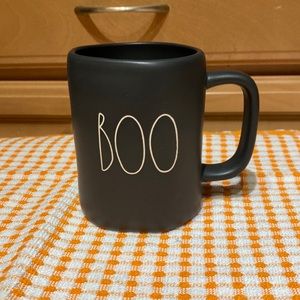 Black Halloween Rae Dunn mug with “boo!” Text